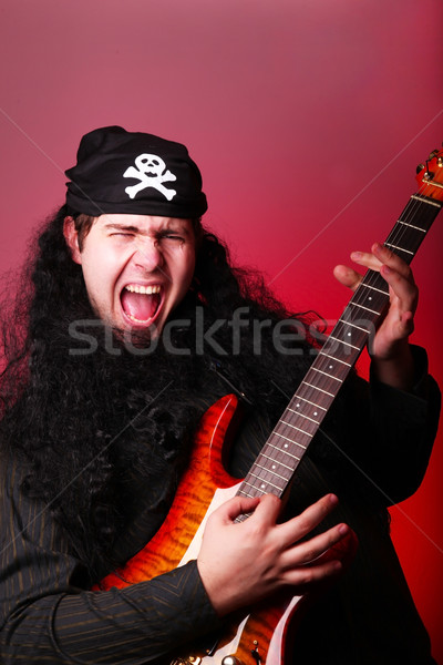 Rock pirate with guitar  Stock photo © Massonforstock