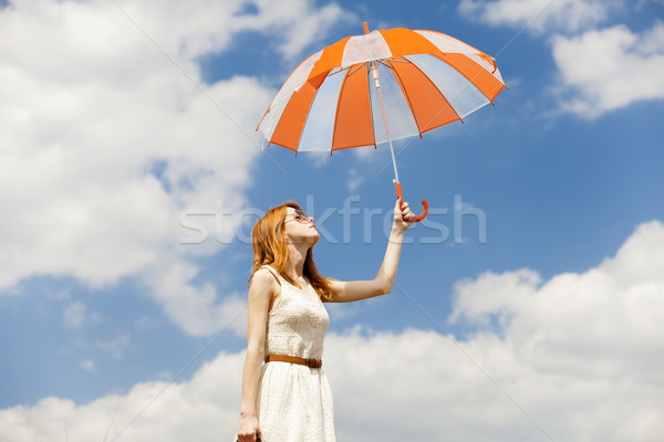 Meisje paraplu hemel schoonheid Blauw kleur Stockfoto © Massonforstock