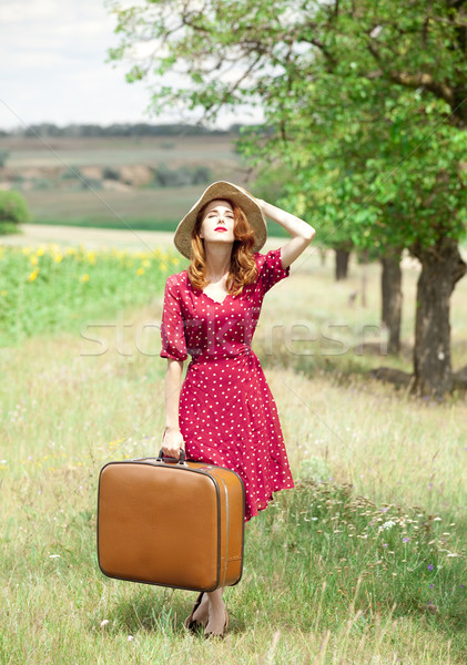 Vörös hajú nő lány bőrönd szabadtér nők divat Stock fotó © Massonforstock