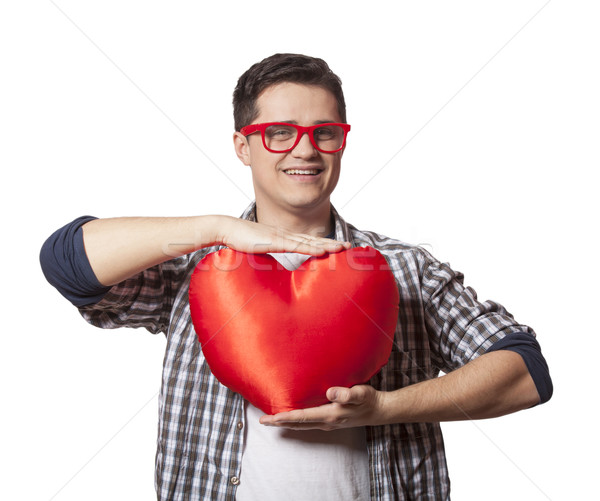 Portrait of a young man with heart shape Stock photo © Massonforstock