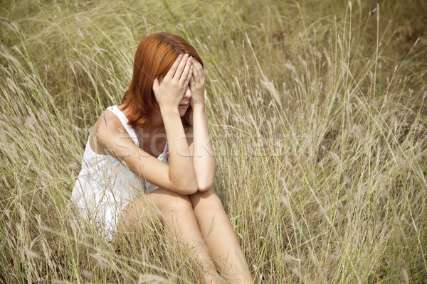 печально девушки трава Открытый фото женщины Сток-фото © Massonforstock