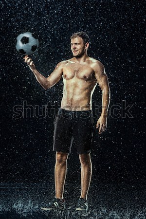 Vízcseppek körül futballista víz fekete férfi Stock fotó © master1305