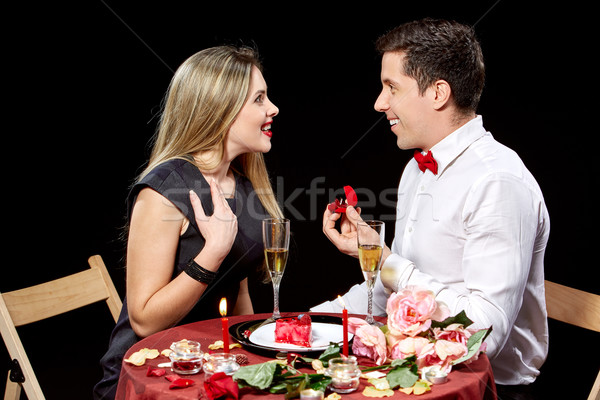 Man proposing marriage to a surprised woman Stock photo © master1305