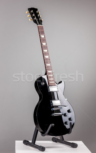 Stock photo: Electric guitar isolated on gray background