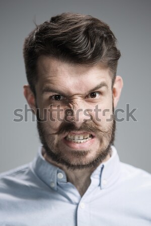 Stock photo: Close up face of  angry man 