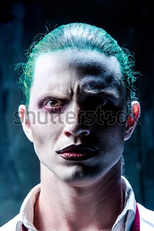 Bloody Halloween theme: crazy killer as young man with blood Stock photo © master1305