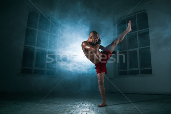 Joven kickboxing azul humo jóvenes masculina Foto stock © master1305