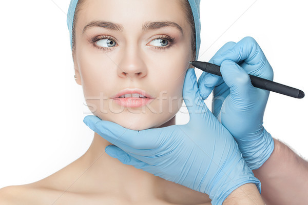 Piękna młoda kobieta chirurgia plastyczna operacja dotknąć twarz kobiety Zdjęcia stock © master1305
