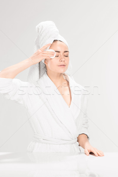 Woman cleaning face in bathroom Stock photo © master1305