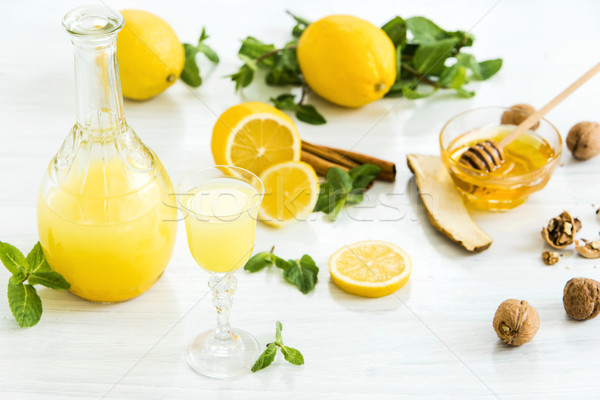 Italian traditional liqueur limoncello with lemon Stock photo © master1305