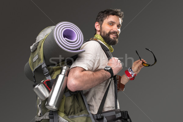 Portrait of a smiling male fully equipped tourist  Stock photo © master1305