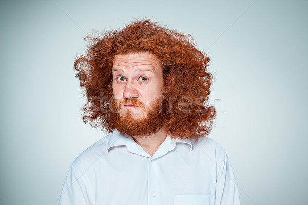 Portré fiatalember megrémült arckifejezés hosszú vörös haj Stock fotó © master1305