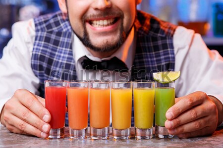 Сток-фото: бармен · работу · коктейли · улыбаясь · службе · напитки
