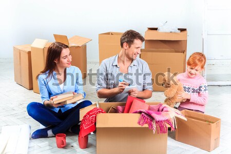 The happy family  during repair and relocation Stock photo © master1305