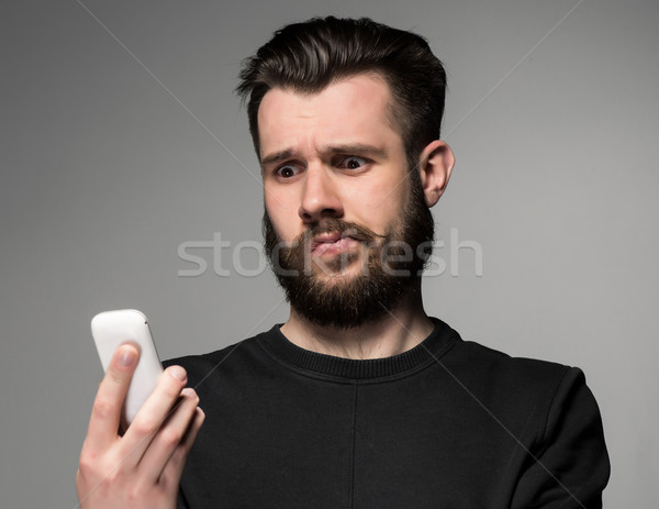 Portret onzeker man praten telefoon grijs Stockfoto © master1305