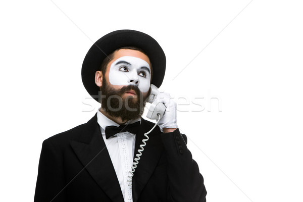 man in the image mime holding a handset.  Stock photo © master1305
