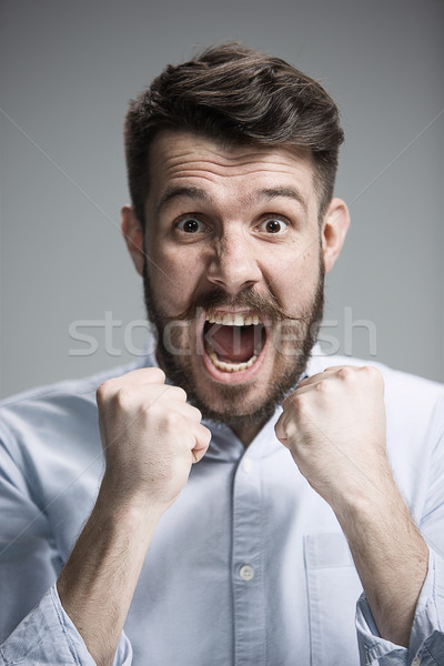 Stock photo: Close up face of  angry man 