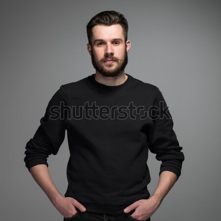 Fashion portrait of young man in black  Stock photo © master1305