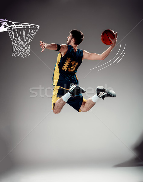 Full length portrait of a basketball player with ball Stock photo © master1305