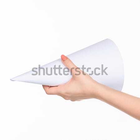 Stock photo: The cone in female hands on white background