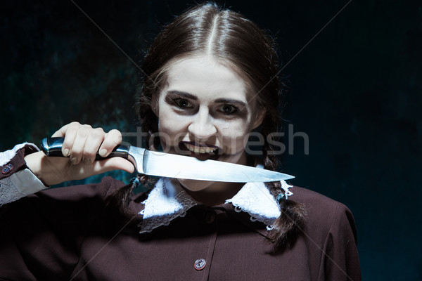 Portré fiatal lány iskolai egyenruha gyilkos nő portré kés Stock fotó © master1305