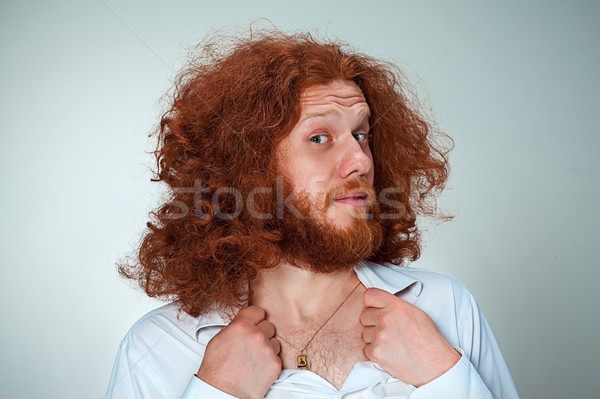 Portrait of young man with shocked facial expression Stock photo © master1305