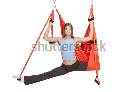 Young woman making antigravity yoga exercises in stretching twine Stock photo © master1305