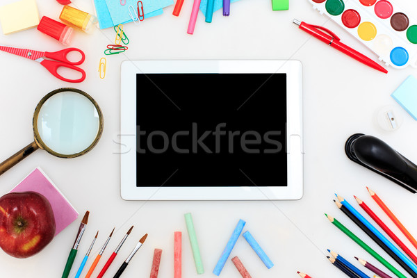 School set with notebooks, pencils, brush, scissors and apple on white background Stock photo © master1305