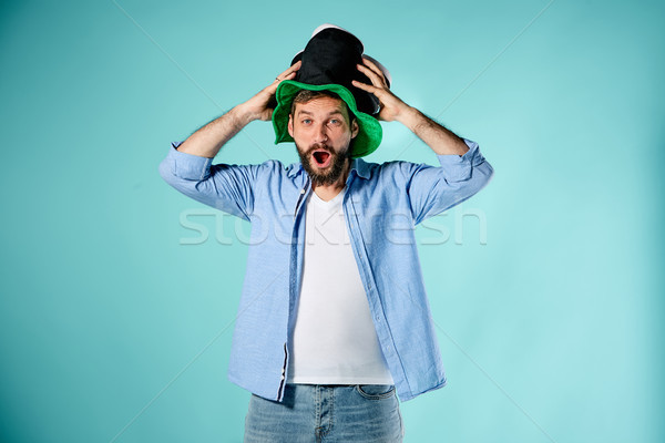 Stock photo: The football fan over blue