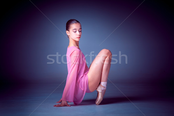 Stock photo: Young ballerina dancer showing her techniques