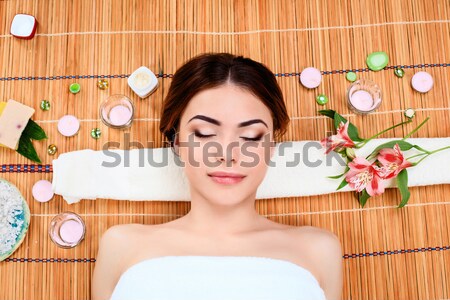 Belle jeune femme spa salon paille [[stock_photo]] © master1305