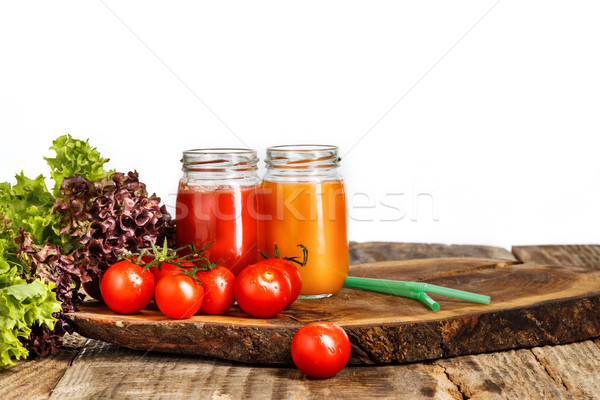The bottles with fresh vegetable juices on wooden table Stock photo © master1305