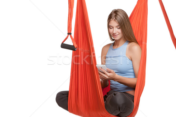 商業照片: 年輕女子 · 坐在 · 吊床 · 瑜伽 · 紅色
