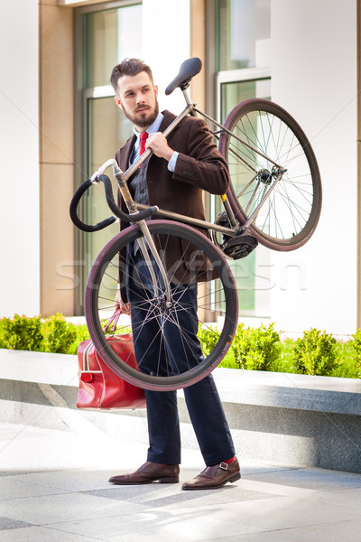 Stock fotó: Jóképű · üzletember · hordoz · bicikli · iroda · piros