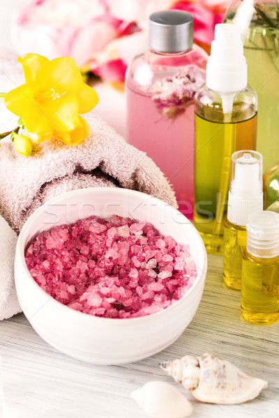 Stock photo: Spa setting with pink roses and aroma oil, vintage style 