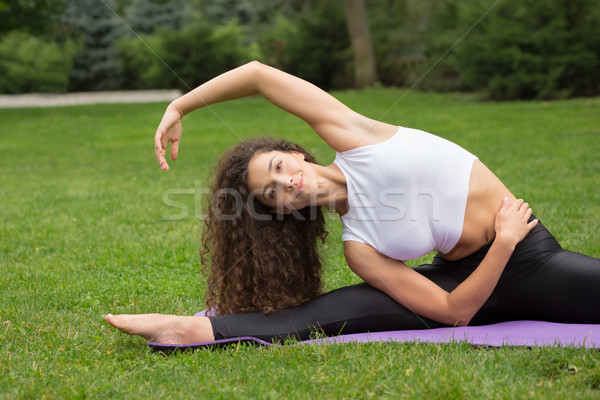 Pretty woman yoga outdoor parco erba verde donna Foto d'archivio © master1305