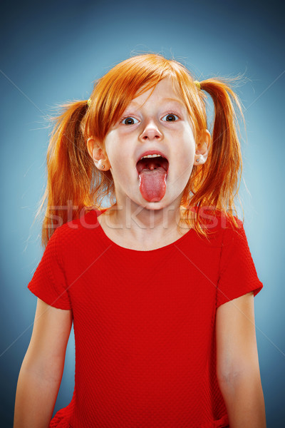 [[stock_photo]]: Belle · portrait · heureux · petite · fille · langue · suspendu