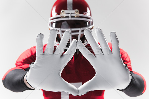 The hands of american football player on white  Stock photo © master1305