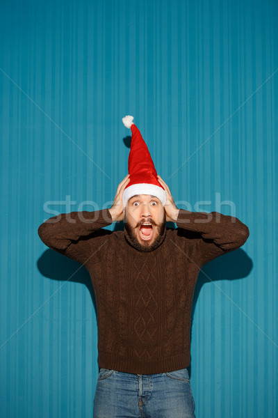 Sorprendido Navidad hombre sombrero Foto stock © master1305