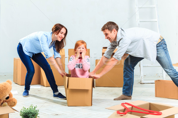 The happy family  during repair and relocation Stock photo © master1305