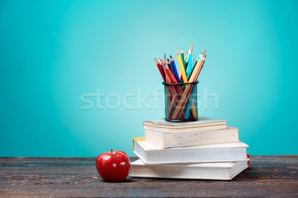 Stock photo: Back to School concept. Books, colored pencils and apple