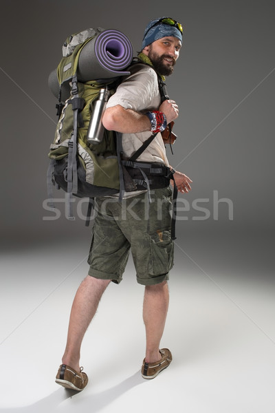 Full length back view of a male fully equipped tourist  Stock photo © master1305