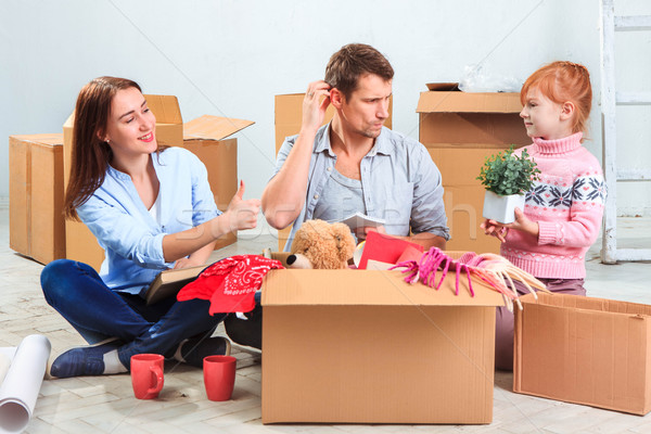 The happy family  at repair and relocation Stock photo © master1305