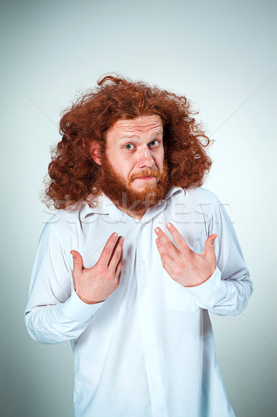 Portrait of young man with shocked facial expression Stock photo © master1305