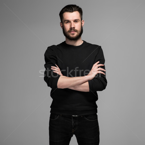 Fashion portrait of young man in black  Stock photo © master1305