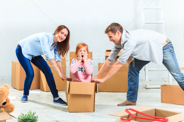 The happy family  during repair and relocation Stock photo © master1305