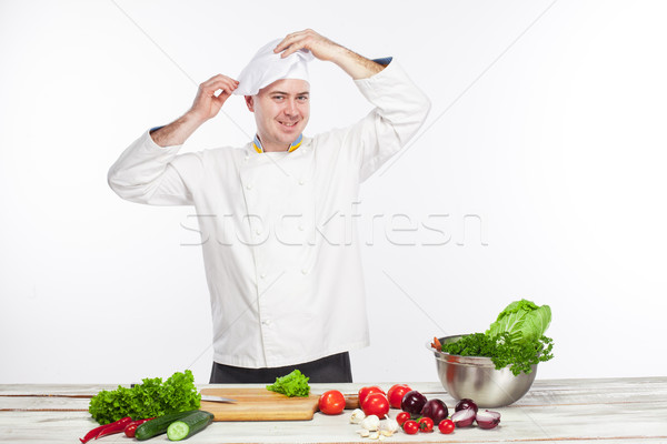 Chef cooking fresh vegetable salad in his kitchen Stock photo © master1305