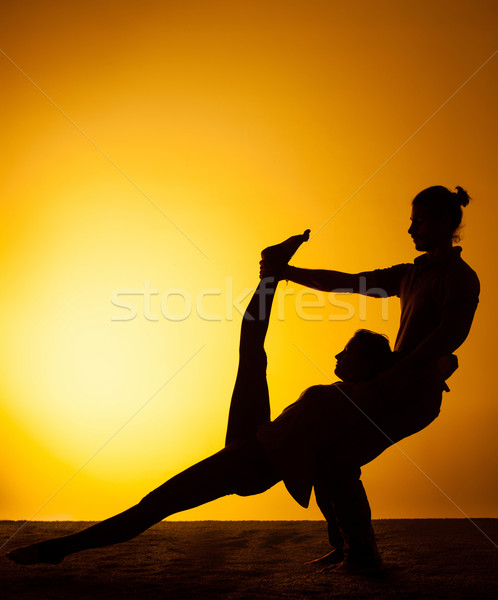Dwie osoby jogi wygaśnięcia świetle dwa Zdjęcia stock © master1305