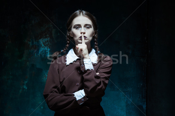 Portré fiatal lány iskolai egyenruha gyilkos nő portré nő Stock fotó © master1305