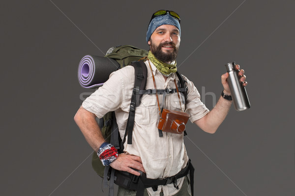 Portrait of a smiling male fully equipped tourist  Stock photo © master1305